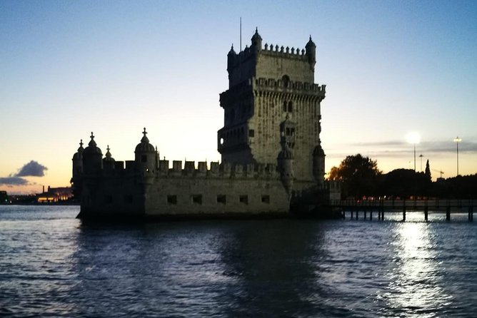 2-Hour Lisbon Traditional Boats Sunset Cruise with White Wine - Wine, music, and the mood onboard