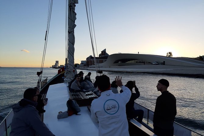 2-Hour Lisbon Traditional Boats Sunset Cruise with White Wine - Weather, comfort, and the sunset gamble