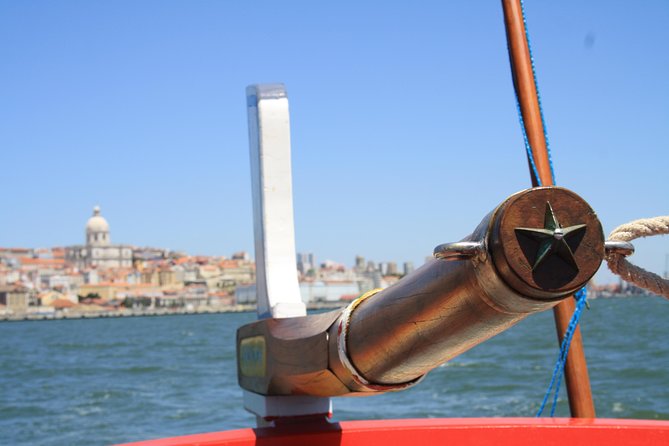 2-Hour Lisbon Traditional Boats Sunset Cruise with White Wine - The old city from the river