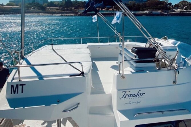 2H Lisbon Private Luxury Catamaran Tour with Welcome Drink - Facing Cristo Rei across the river