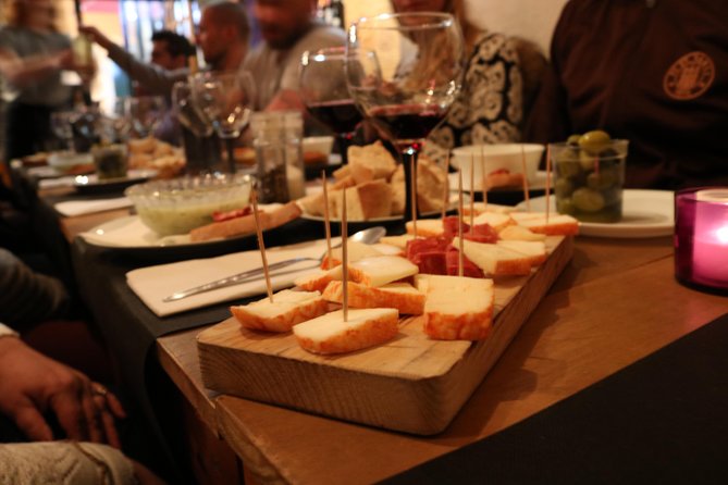 A True Taste of Lisbon: Portuguese Tapas, Wine & Surprise Drink - Key points at a glance