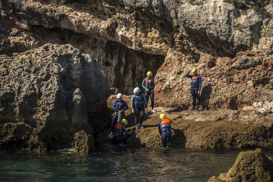 Arrábida: Setubal, Sesimbra Coasteering & Speedboat Tour - More than a dozen jumps from 2 to 8 meters