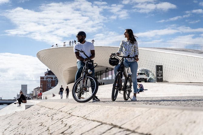 Belém E-Bike Guided Tour Explore Lisbon by the river - Under the 25 de Abril Bridge