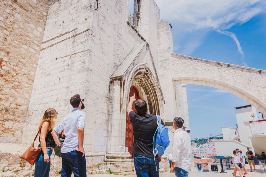 Best of Lisbon Walking Tour: Rossio, Chiado & Alfama - Starting beneath Lisbon’s statue of Pedro IV