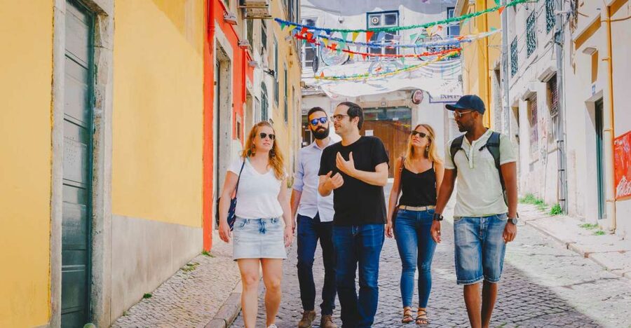 Best of Lisbon Walking Tour: Rossio, Chiado & Alfama - Rossio Station and its neo-Manueline doorway