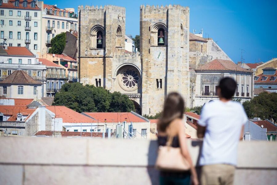 Best of Lisbon Walking Tour: Rossio, Chiado & Alfama - Alfama, tiled façades, and the sound of Fado