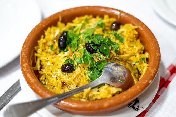 Devour Lisbon: The Ultimate Portuguese Food Tour - O Trevo delivers the bifana