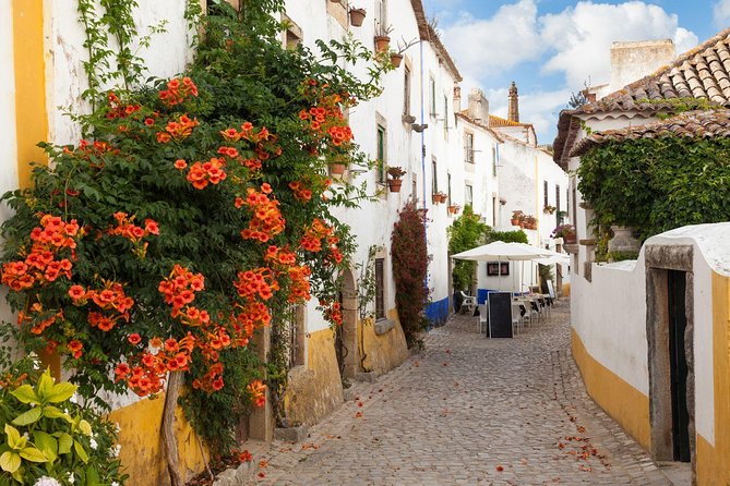 Fátima, Nazaré, and Óbidos: Small Group Tour From Lisbon - Nazaré Lighthouse and North Beach