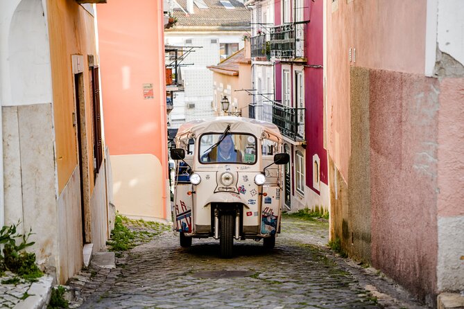 Food & Wine Lisbon Tour with Local Guide in Private Eco Tuk Tuk - Key points at a glance