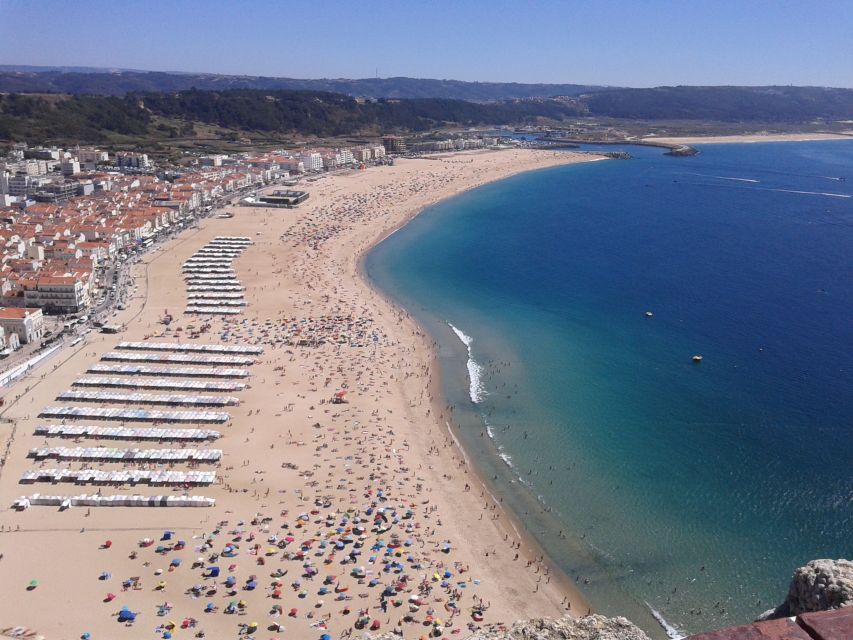 From Lisbon: Fátima, Óbidos Medieval, Nazaré Atlantic Coast - Nazaré: cliffs, fishing traditions, and Atlantic air