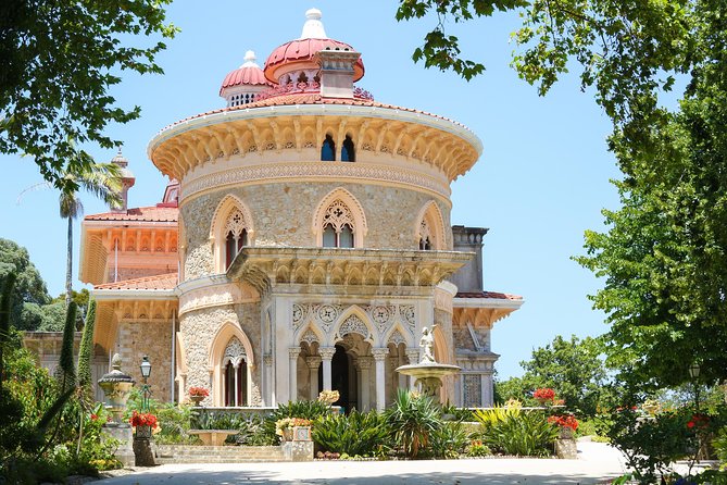 From Lisbon Sintra Highlights Tour - Pena, Regaleira & Monserrate - Sintra National Palace and its twin chimneys