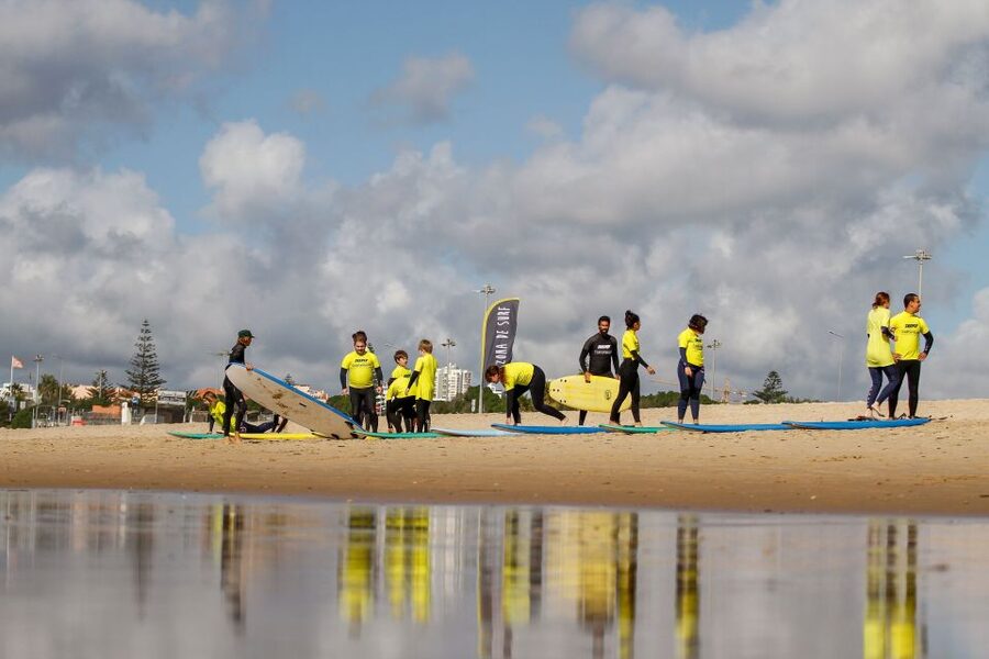 Lisbon: 1.5-Hour Surf Lesson - Entering the Atlantic at Carcavelos
