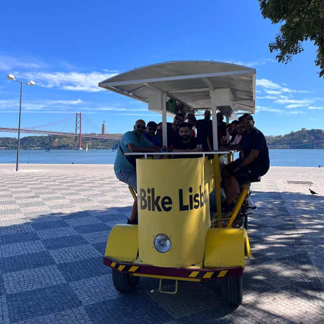 Lisbon: 1-Hour Beer or Sangria Bike Sightseeing Tour - The 25 de Abril Bridge photo stop