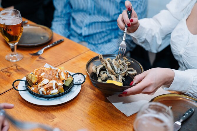 Lisbon: Award-Winning Guided Walking Food Tour with Local Drinks - Bifana, croqueta, and an ice-cold beer