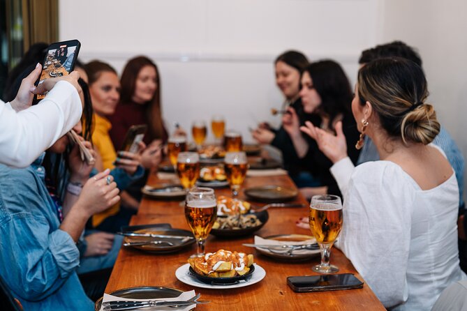 Lisbon: Award-Winning Guided Walking Food Tour with Local Drinks - What the $76.46 price buys you
