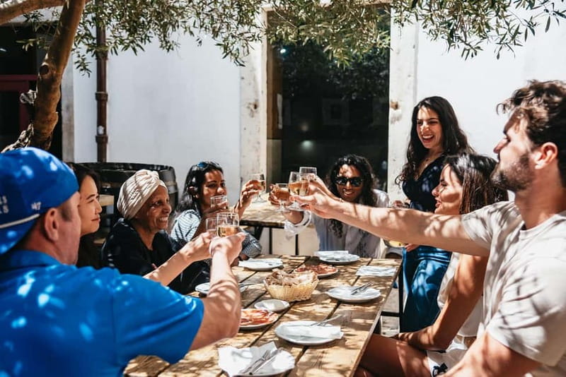 Lisbon: Baixa District Food Tour with Dinner and Drinks - Praça Dom Pedro IV: food with a landmark lesson