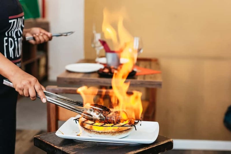 Lisbon: Baixa District Food Tour with Dinner and Drinks - What the guide adds to the meal