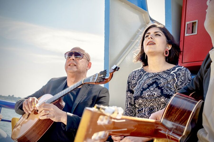 Lisbon: Boat Cruise with Live Fado Performance and a Drink - What the small boat changes