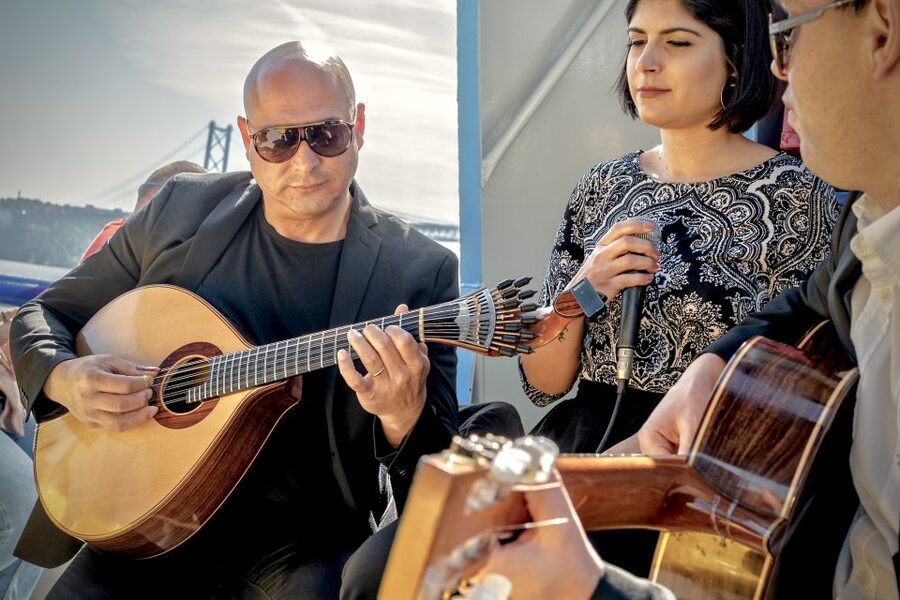 Lisbon: Boat Cruise with Live Fado Performance and a Drink - Boarding at Cais do Sodré