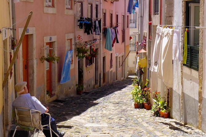 Lisbon by Night Tour: Fado Show and Dinner with Pick-up - Dinner, wine, and the live performance