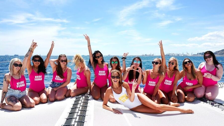 Lisbon: Catamaran Boat Party with Music, Open Bar & Dives - Cruising toward Algés with music on deck