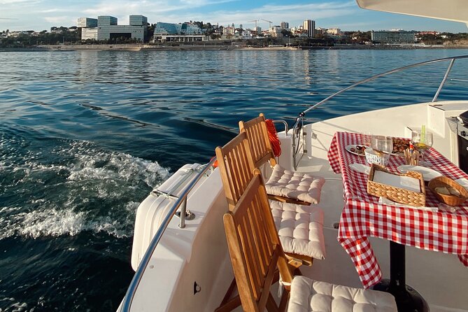 Lisbon: Catamaran Luxury Sunset and Wine Tour - Under the 25 de Abril Bridge