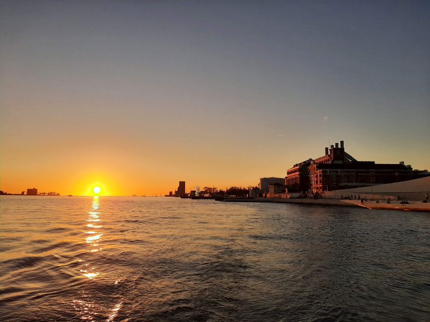 Lisbon: City Skyline Sailboat Cruise with Drink and Snacks - Starting beneath the 25 de Abril Bridge