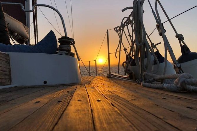 Lisbon: Daylight or Sunset on a Vintage Sailboat - Christ the King across the river