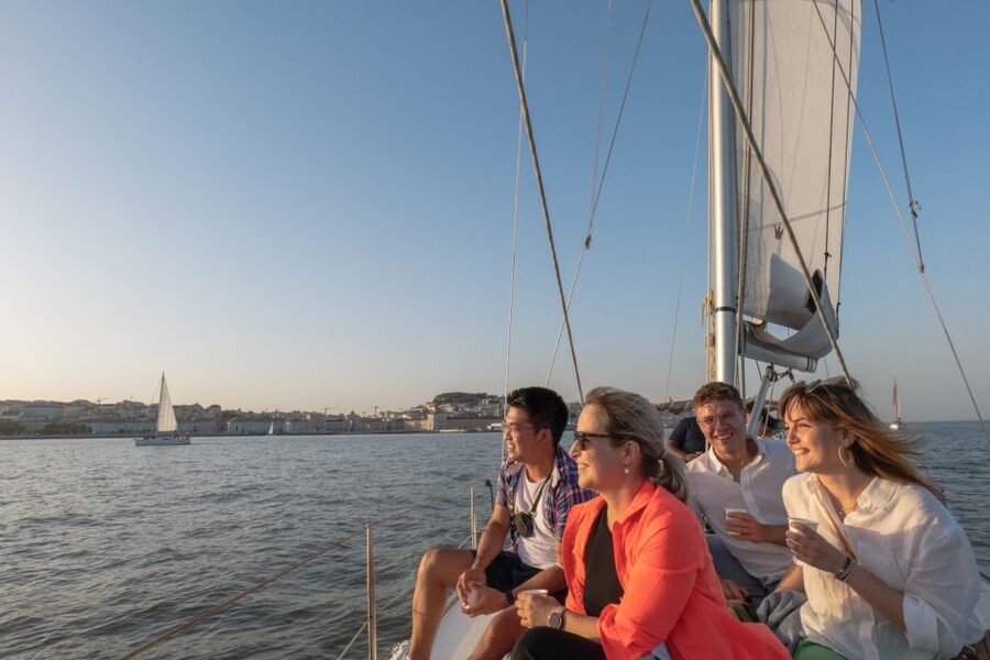 Lisbon: Daytime/Sunset/Night City Sailboat Tour with Drink - Sailing beneath the 25 de Abril Bridge