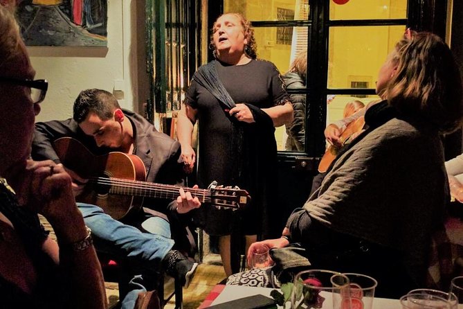 Lisbon Fado Experience: Walking Tour, Dinner and Live Music Show - Alfama after dark