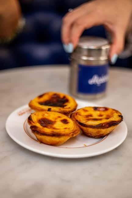 Lisbon: Food Tasting Tour by Tuk Tuk with 2 Stops - Baixa finishes with something sweet