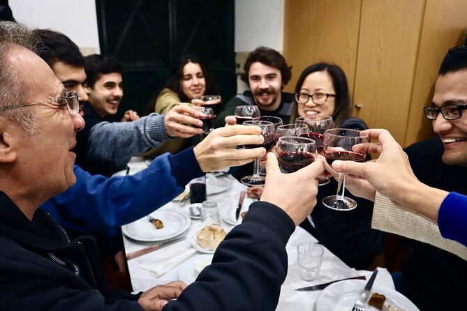 Lisbon Food Tour with 10+ Tastings of Local Delicacies & Wines - Baixa, the Santa Justa Lift, and Lisbon’s rebuilt center