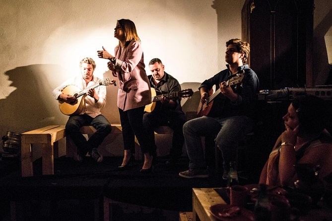 Lisbon Food Tour with 3 Stops and Fado Show Performance - Stop one: a Portuguese bar and the bifana tradition