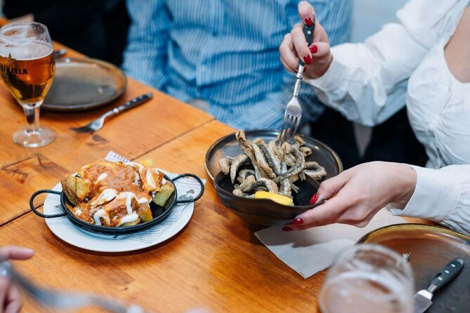 Lisbon Food Tour with Portuguese Wine: Taste the Best of Portugal - Rua dos Fanqueiros: petiscos and flame-grilled chouriço
