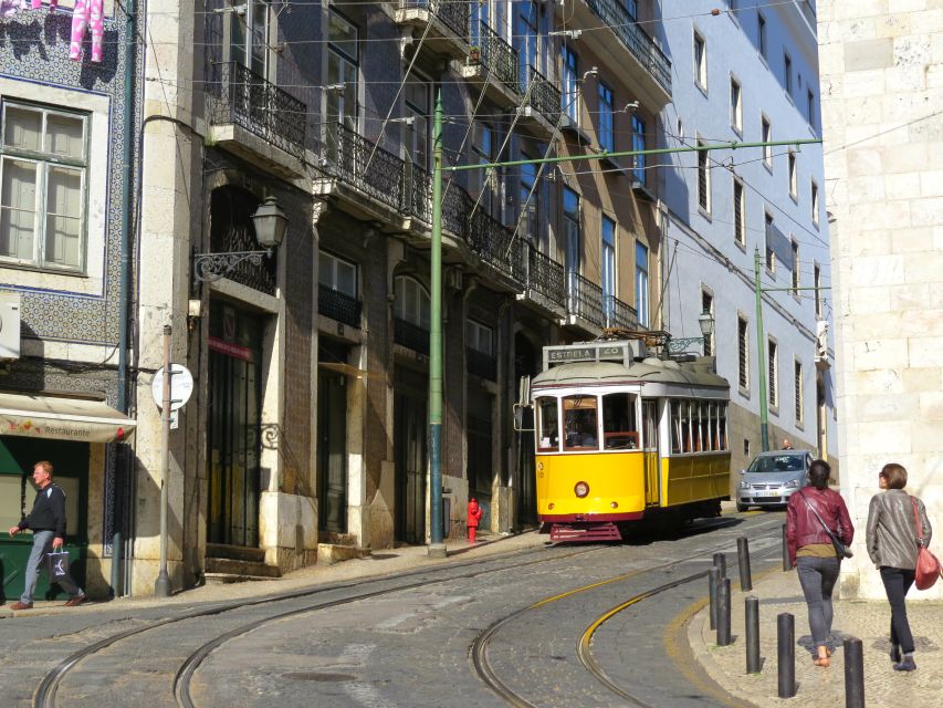 Lisbon: Full-Day Small-Group City Tour with Hotel Pickup - What the vehicle and group size change