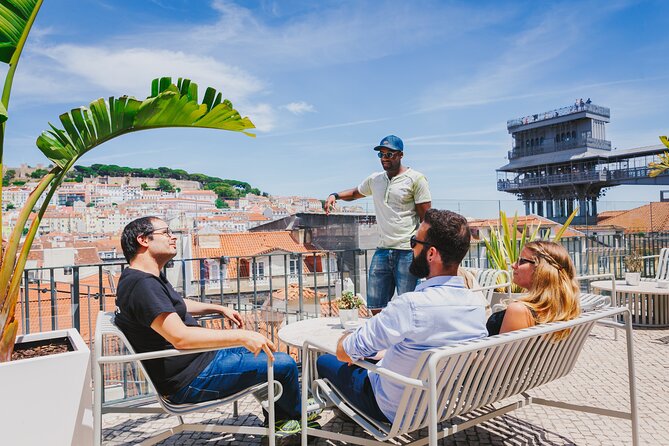 Lisbon Hidden Gems Walk: Traditions, Lunch and Ferry ride - Carmo Convent, city views, and a Portuguese beer