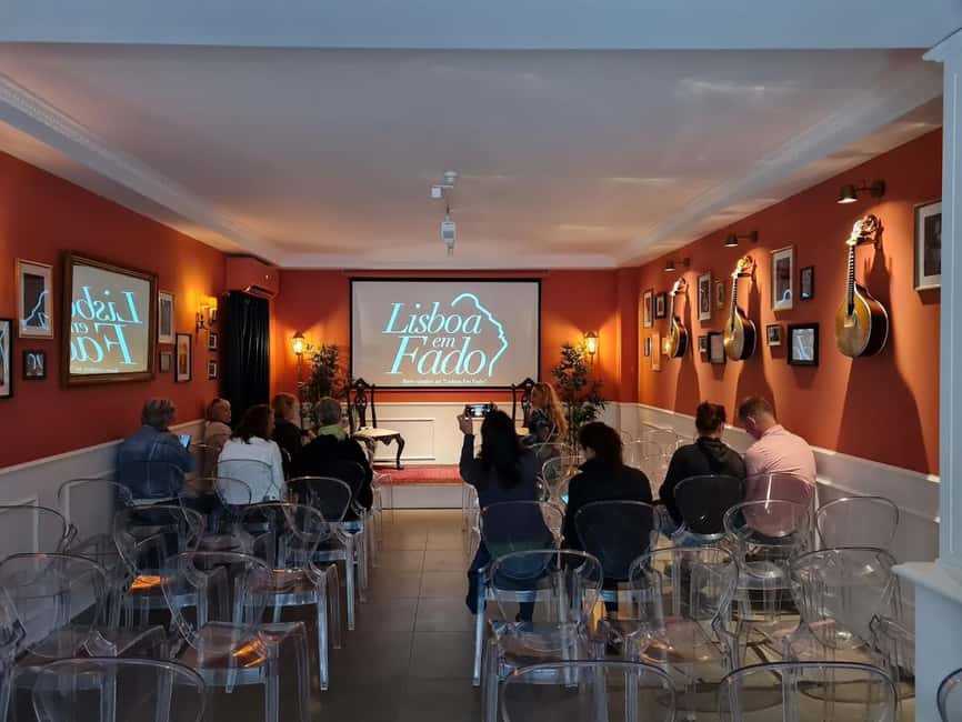 Lisbon: Live Fado Show with Port Wine in Historic Center - Language and accessibility