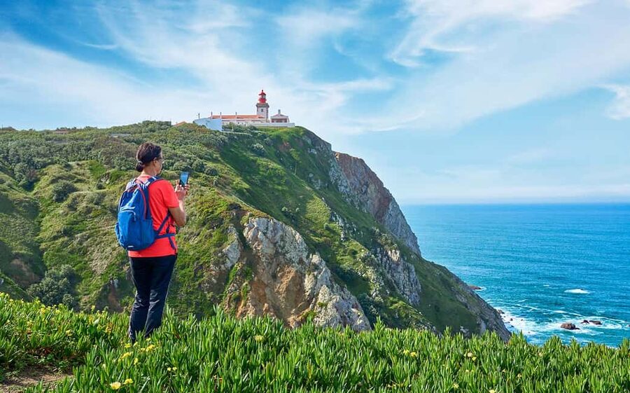 Lisbon: Pena Palace, Sintra, Cabo da Roca & Cascais Day Tour - Pena Palace: colorful walls, mountain views, and one key limitation