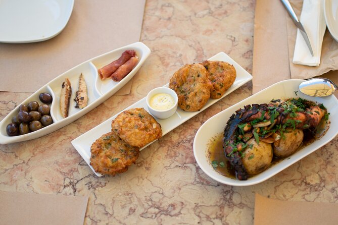 Lisbon Portuguese Food Tour - Several restaurants, with Lisbon between the stops