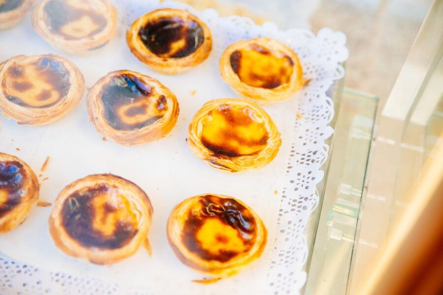 Lisbon: Private Food Tour – 10 Tastings with Locals - Walking through Largo do Chiado