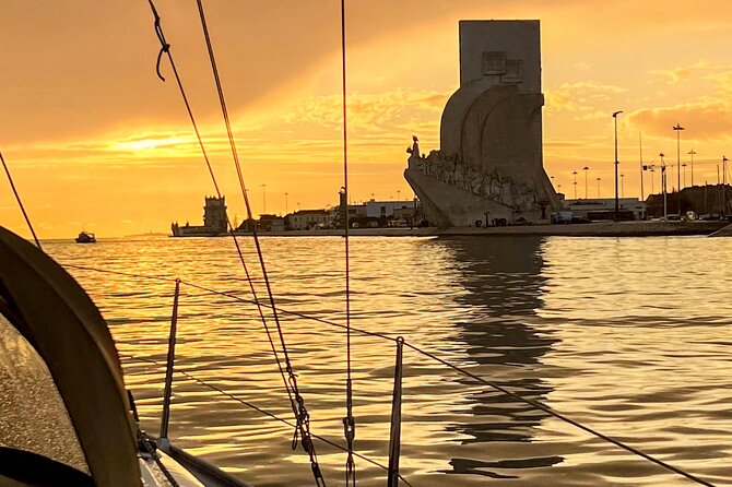 Lisbon Private Luxury Boat Tour with Welcome Drink - Passing beneath the 25 de Abril Bridge