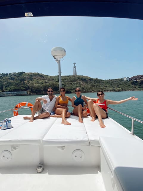 Lisbon: Private Luxury Catamaran Tour with Welcome Drink - The 25th of April Bridge and Lisbon’s riverfront