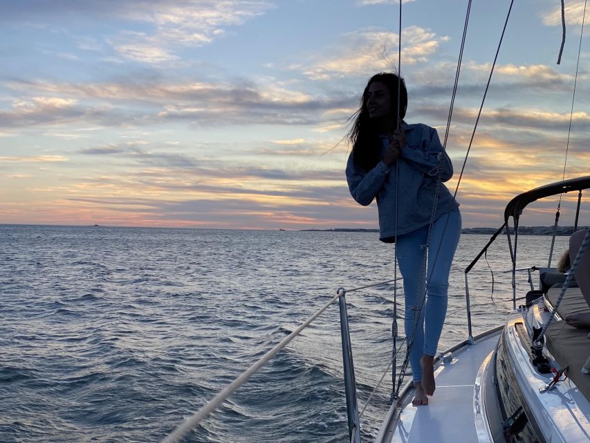 Lisbon: Private Tagus River Sunset Cruise on a Luxury Boat - Bairro Alto, Commerce Square, and the Castle Quarter