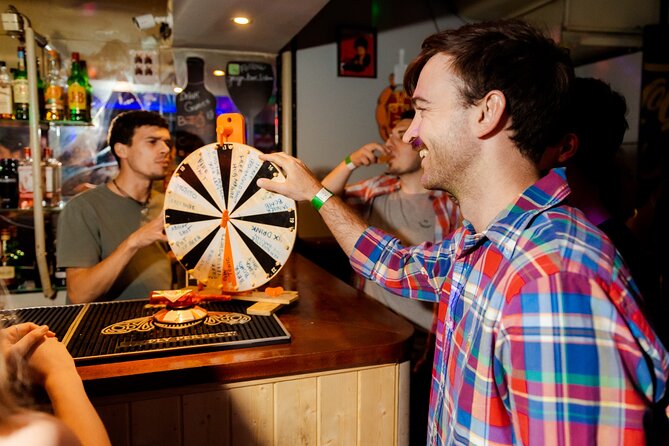 Lisbon: Pub Crawl with Open Bar, Shots & VIP Club Entry - Pink Street: a famous photo stop with a party mood