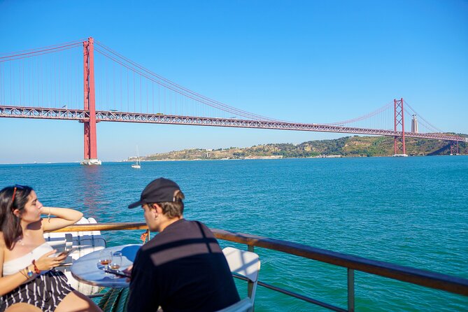 Lisbon River Boat Sightseeing Tour with a Drink - Under the 25 de Abril Bridge