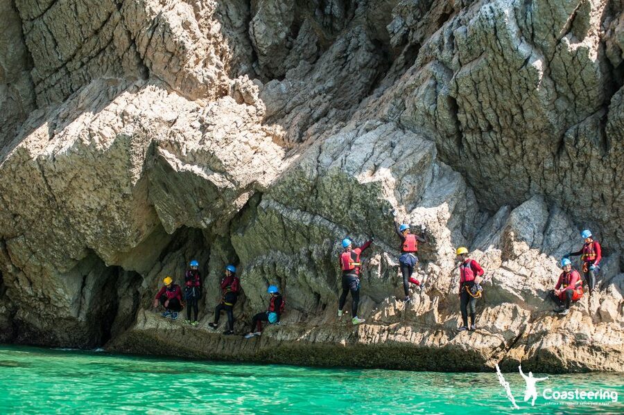 Lisbon: Sesimbra/Arrábida Natural Park Coasteering Adventure - Getting fitted with a wetsuit, helmet, and harness
