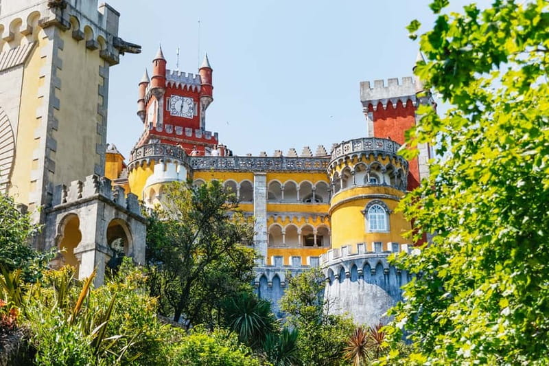 Lisbon: Sintra, Pena, Cabo da Roca, Cascais Tour with Pickup - Leaving Lisbon in a small minivan