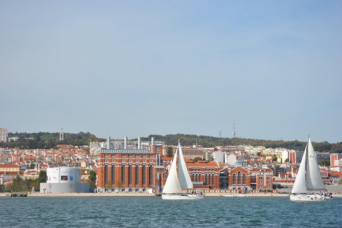 Lisbon Small Group Day Cruise with Historic Commentary & a Drink - Praça do Comércio and the 1755 earthquake