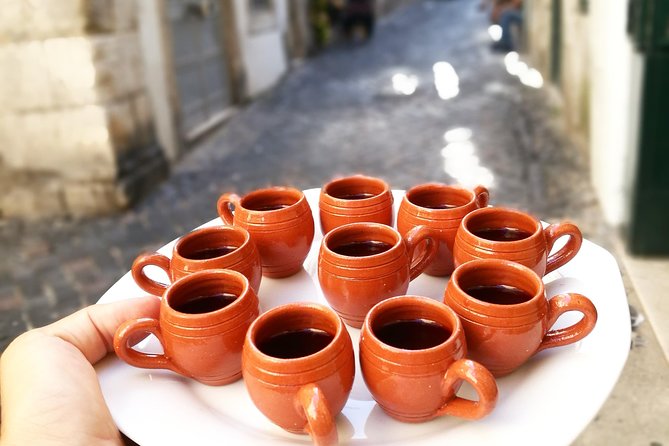 Lisbon Small-Group Food Tour with 18 Tastings in Alfama District - The stories between the plates