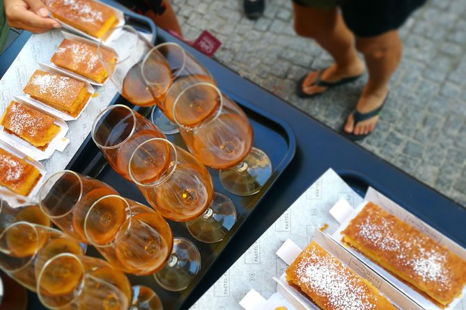 Lisbon Small-Group Food Tour with 18 Tastings in Alfama District - Eating your way through Alfama